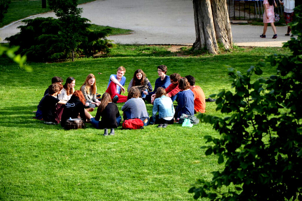 Students sitting in nature