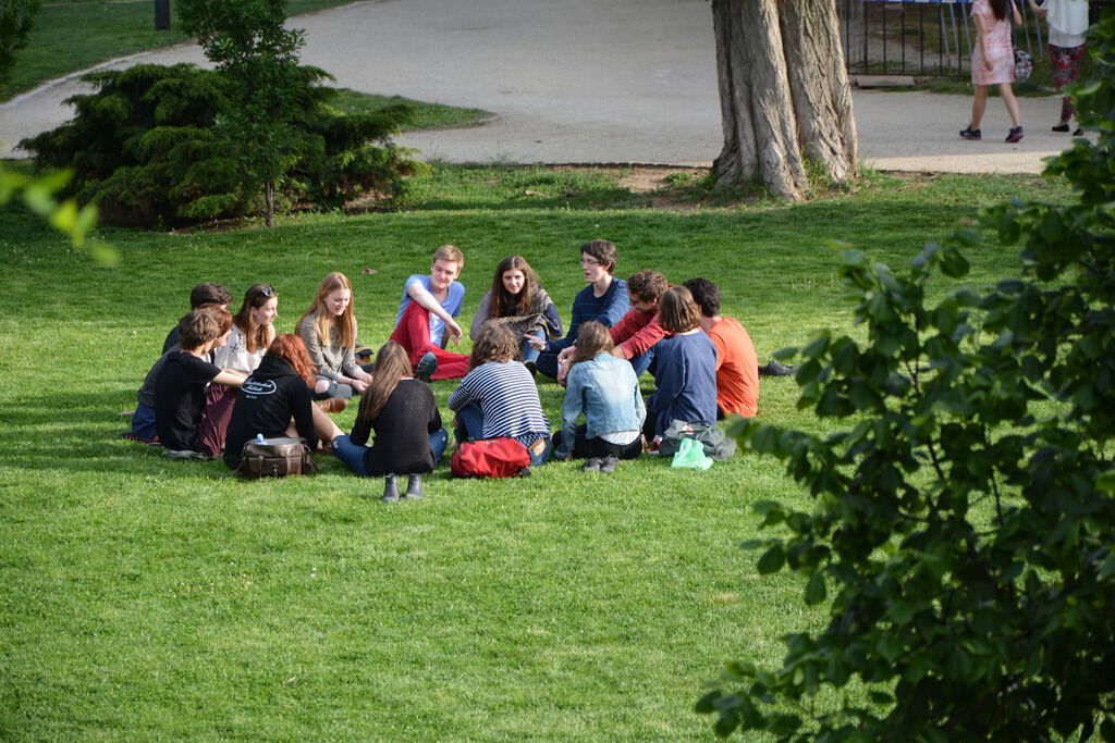 Students sitting in nature